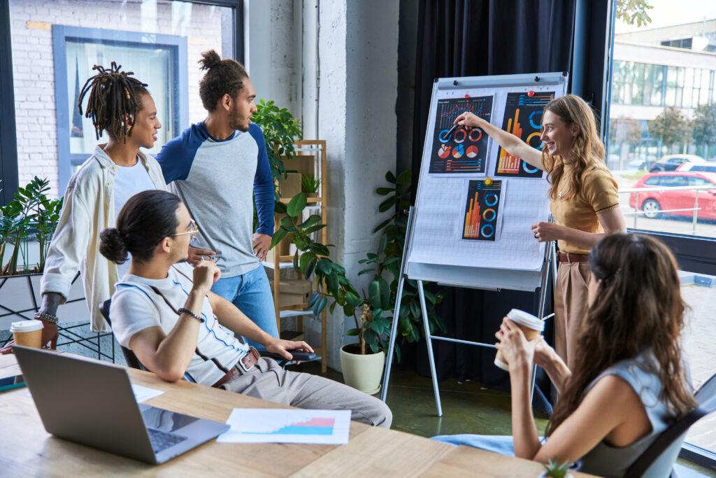 businesswoman pointing at flip chart and discussi 2024 11 14 11 39 13 utc