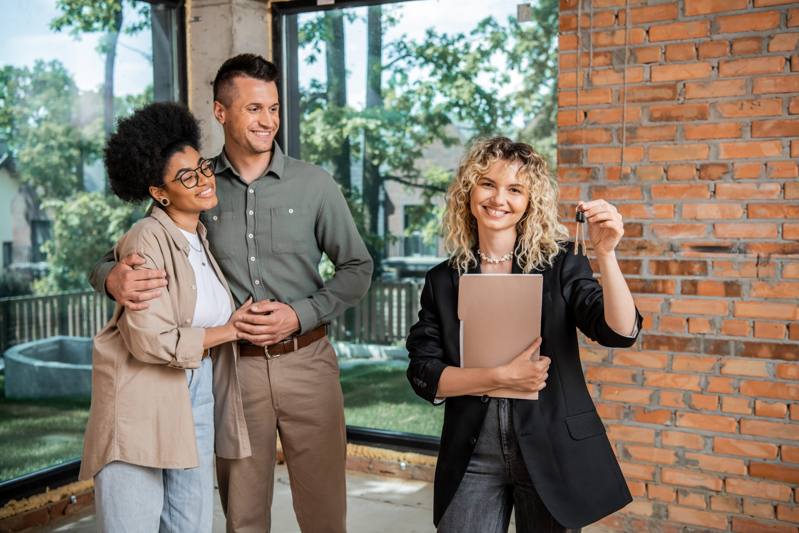 joyful real estate agent with folder holding keys 2024 11 09 02 58 28 utc scaled